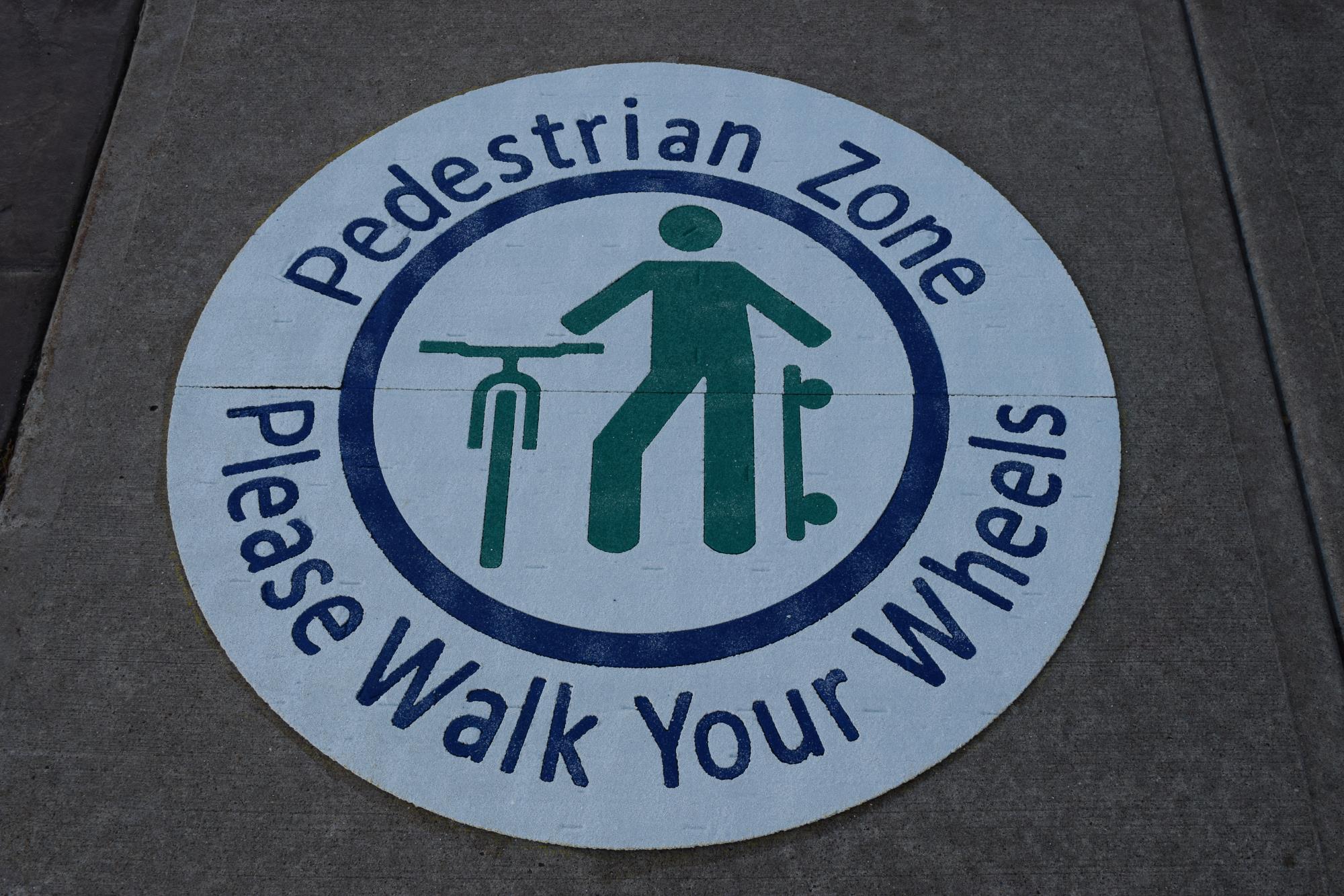 Walk your wheels sign